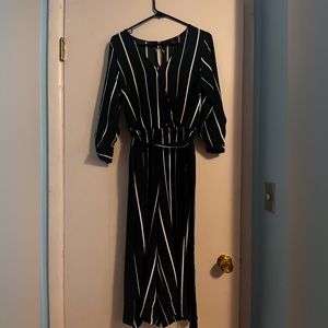 Jumpsuit, navy blue with white stripes size medium by the brand Iris